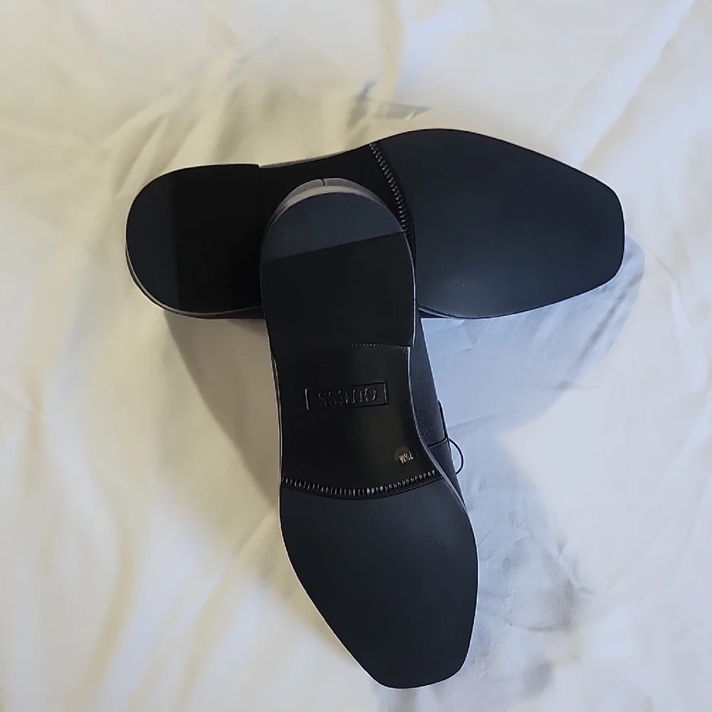 GUESS Men's Black Slip-On Loafers with Silver Accent